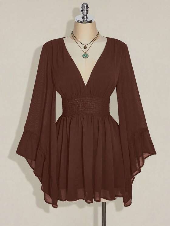 A-line style with V-neckline, gathered waist and bell sleeves